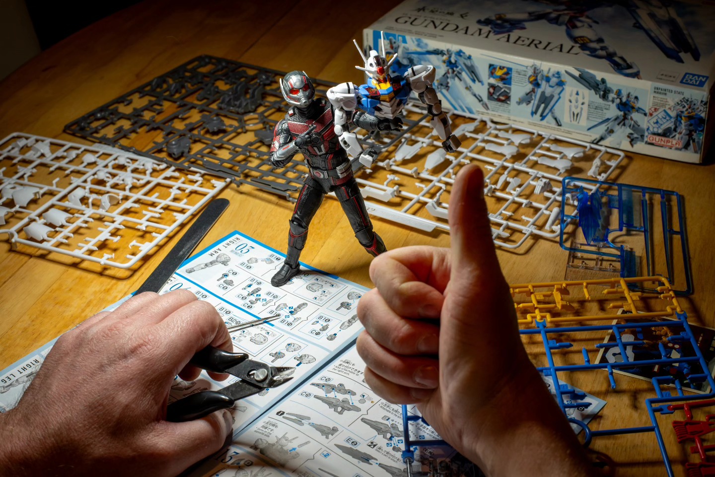 Antman gave me a "helping" hand building my gundam Aerial model. He is a bossy sod tho!!! · 2