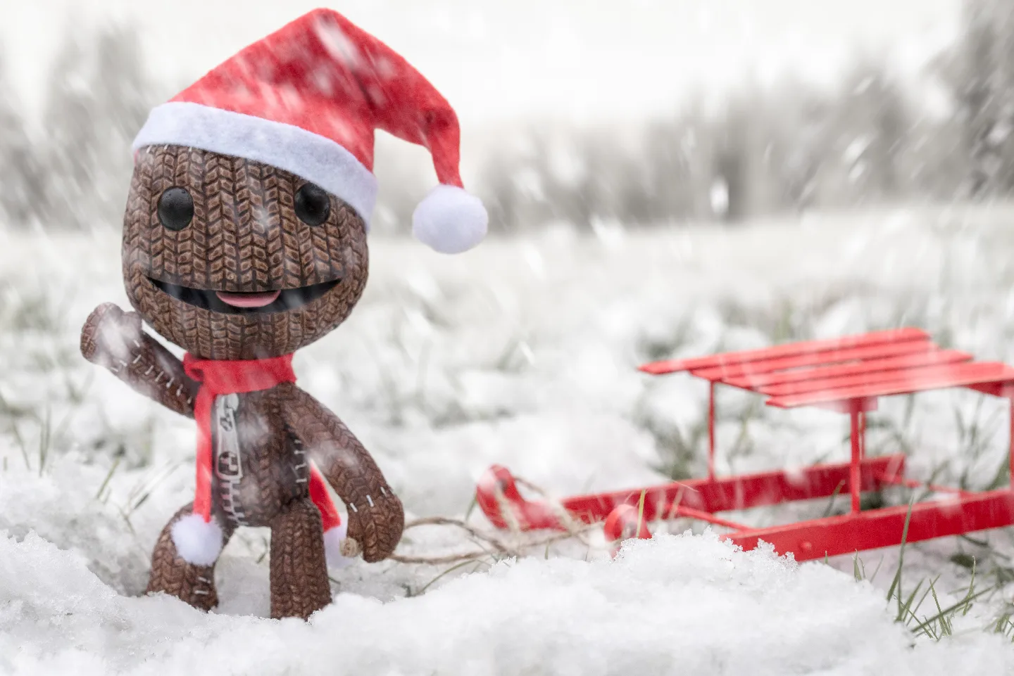 Sackboy is making use of the very brief snow we have had here in the UK. I made the hat and scarf myself and I